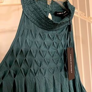 Jade green high neck tank with exquisite detail